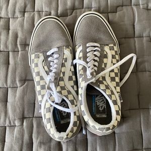 Grey and white checkered low top vans size 10.5
